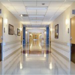 Ceiling Fixtures and Wall Sconces Provide Bright, Cheerful Patient Corridors